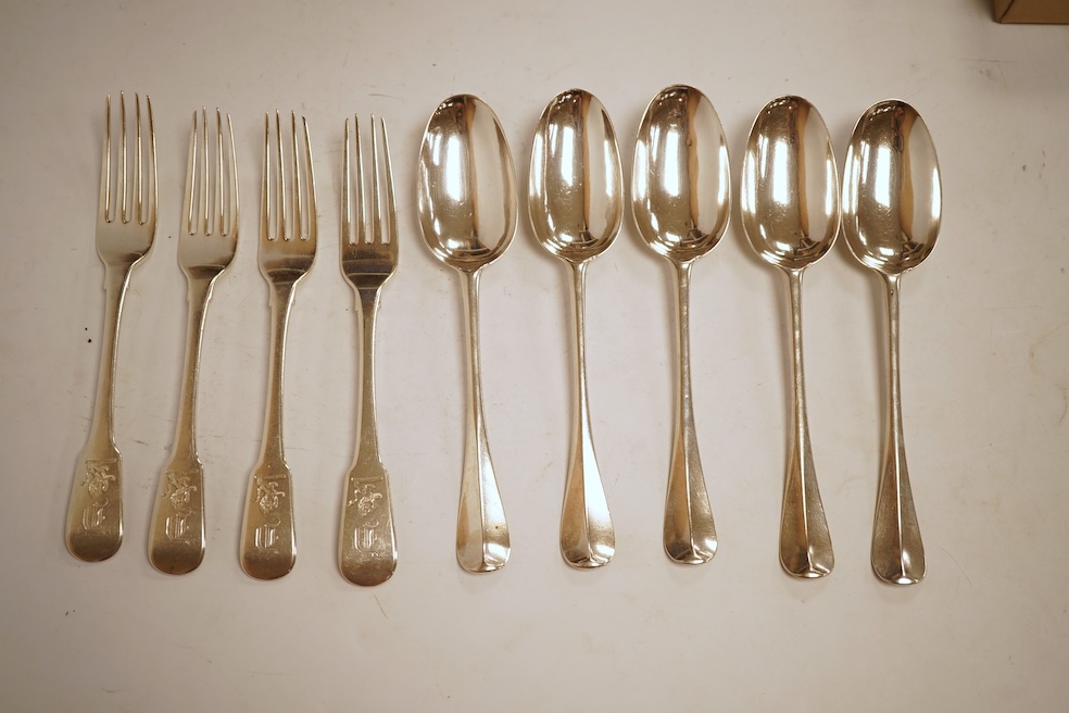 A set of five George I silver Hanoverian rat-tail pattern table spoons by Samuel Hitchcock, London, 1725 and four George IV silver fiddle pattern table forks, with engraved initial and crest, William Bateman, London, 182